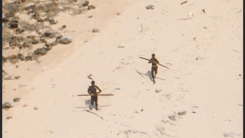 North Sentinel Island. Residents shoot at a helicopter with a bow and arrow