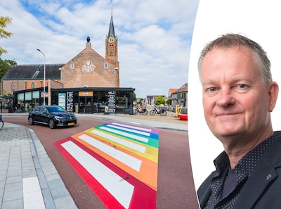 Moet je stoppen voor voetgangers op een regenboogzebrapad?