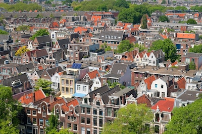 Oud-Amsterdammers missen de Albert Cuyp en hun broodje Van Dobbenkroket, maar geven geboortestad nu