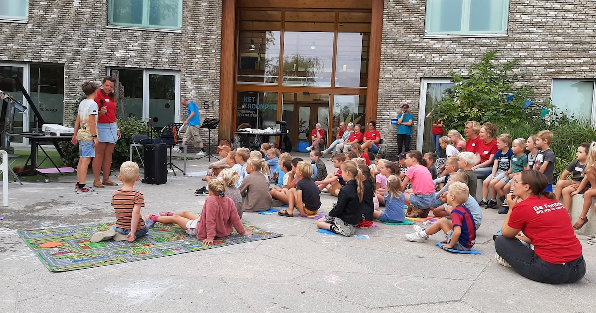 Dit stuurden jullie in: Kinderfeest in Apeldoorn • Poes geniet van het weer • Muzikale bloemen
