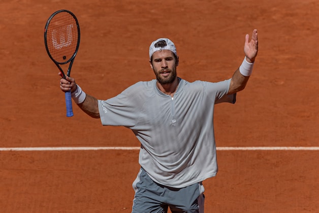 Karen Khachanov is angry with herself. 